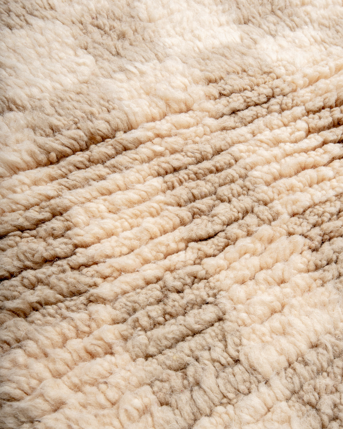 Modern, designer, handcrafted Berber rug from Morocco. Beniourain carpet with beautiful colours and patterns and fluffy wool texture.